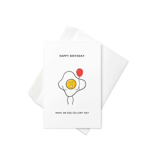 Cute fried egg illustration holding a red balloon, with the text “Happy Birthday, Have an Egg-cellent Day”

Start their special day sunny side up! This playful birthday card features a simple, sweet drawing of a smiling fried egg clutching a red balloon, paired with the punny message “Have an Egg-cellent Day.” It’s the perfect feel-good card for food lovers, pun fans, or anyone who enjoys a bit of breakfast-themed cheer on their birthday.

🍳 Fun and light-hearted birthday card with food pun